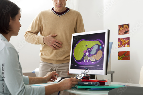 Obraz na płótnie Models On screen, abdominal scanner (healthy) We can see the liver (in green), t