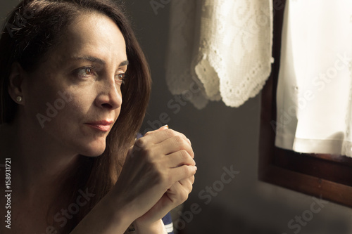 Portrait of a woman thinking.