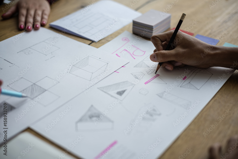 Hands Writing Drawing on Idea Paper Working Hands Writing Drawing on Idea Paper Working