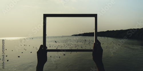 Hands Holding Photo Frame Outdoors Ideas photo