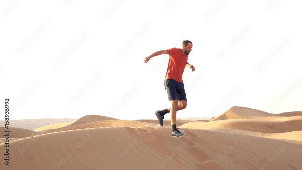 Young man running on desert, super slow motion 120fps
Young man running on desert, super slow motion 120fps