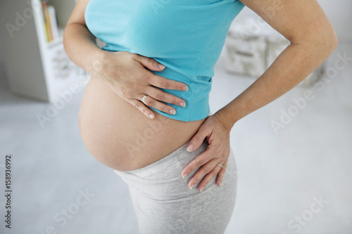 Lower back pain, pregnant woman