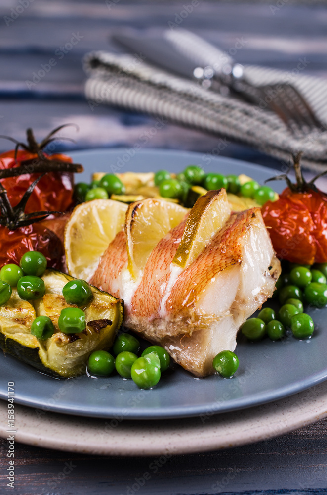 Baked fish with vegetables Baked fish with vegetables