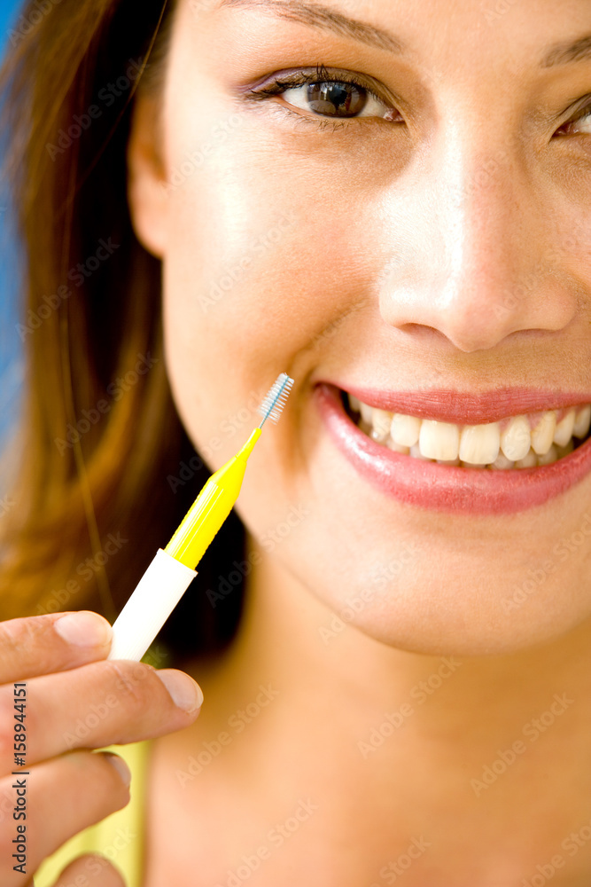 Model Interdental brush enables to clean the space between two teeth Model Interdental brush enables to clean the space between two teeth