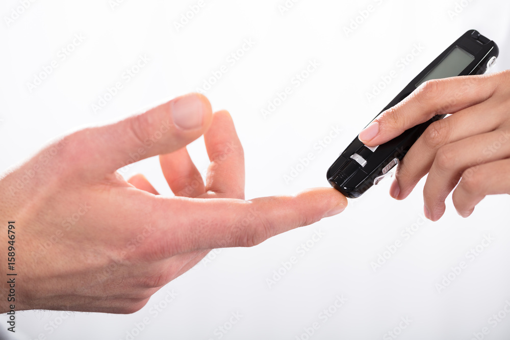 Finger Prick For Glucose Sugar Measuring Level Blood Test Finger Prick For Glucose Sugar Measuring Level Blood Test
