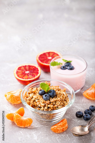 Healthy breakfast - muesli  yogurt and fruit. Selective focus. Copy space