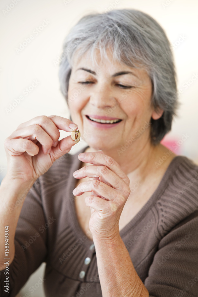 Elderly person eating Elderly person eating