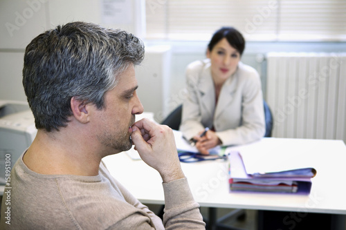 Man in consultation, dialogue