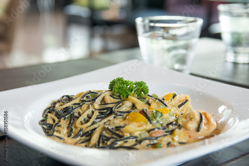 black Spaghetti With shrimp in spinach cream Sauce