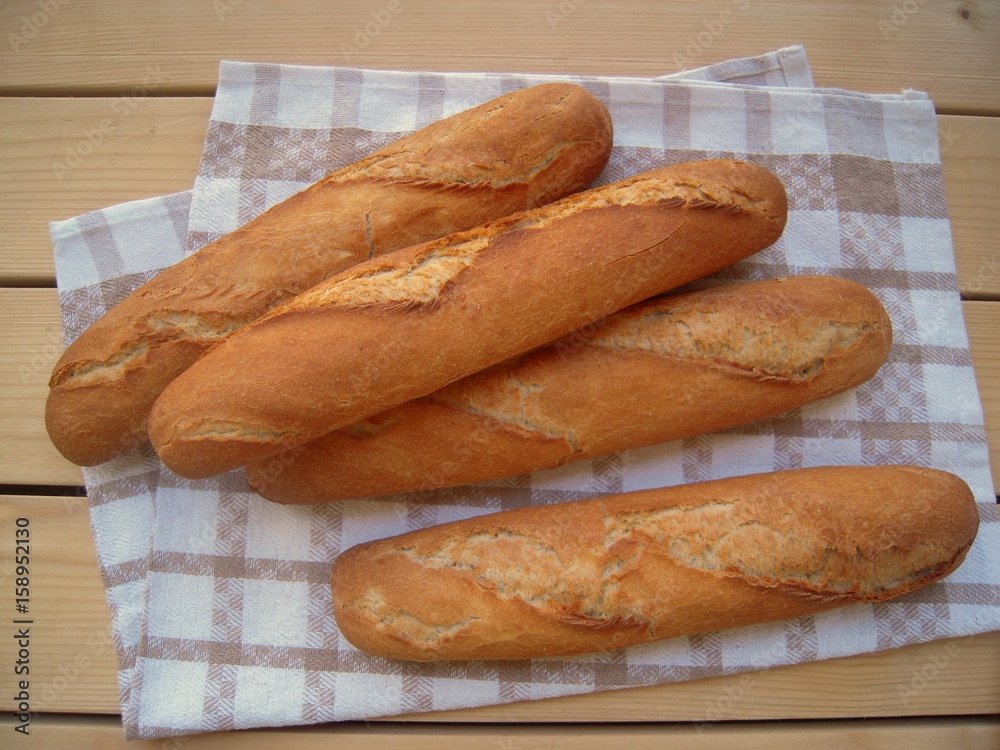Baguettes on a rustic table........