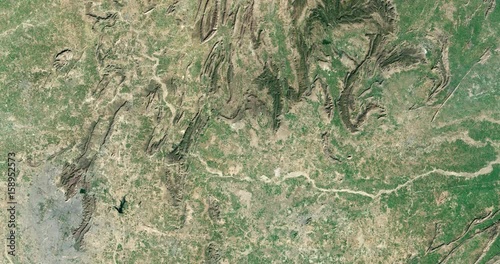 High-altitude overflight aerial of the Aravalli range and surrounding land, India. Clip loops and is reversible. Elements of this image furnished by USGS/NASA Landsat