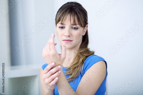 Woman suffering from wrist pain