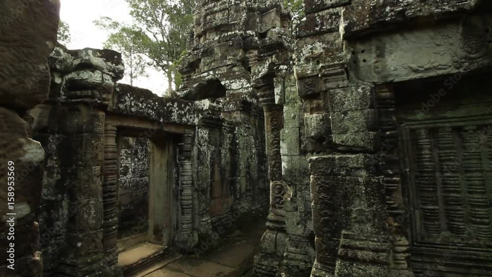 Entering more deeply into temple complex, smooth forward tracking shot, Prasat Kravan temple in Angkor Wat area, Cambodia Entering more deeply into temple complex, smooth forward tracking shot, Prasat Kravan temple in Angkor Wat area, Cambodia