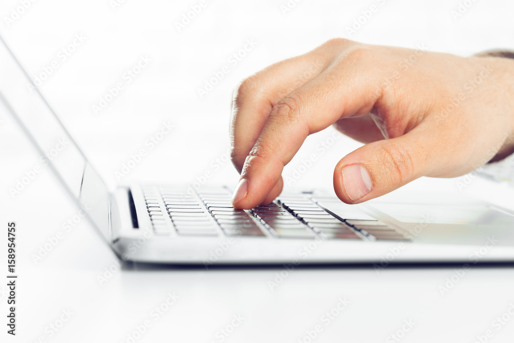Businessman working on laptop. On the table Businessman working on laptop. On the table