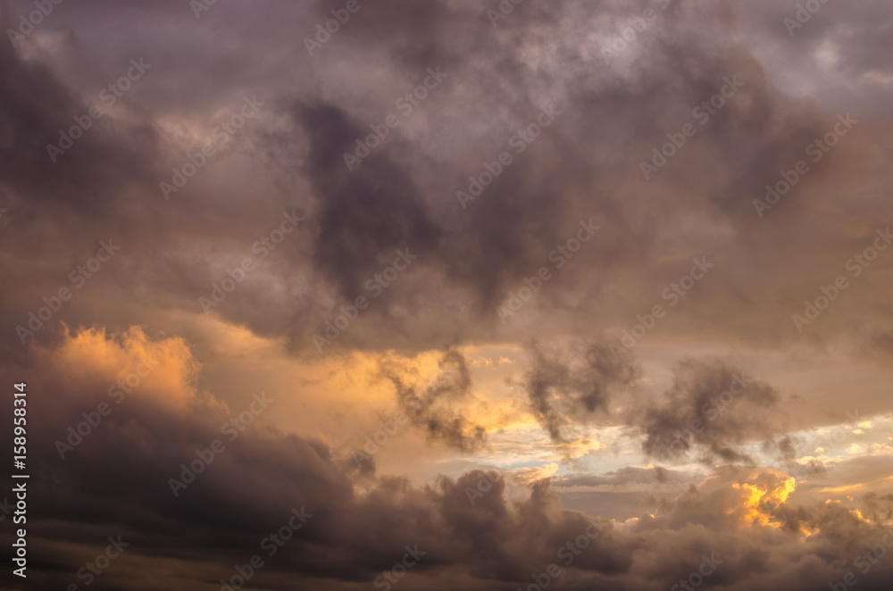 Storm clouds in the sunset light