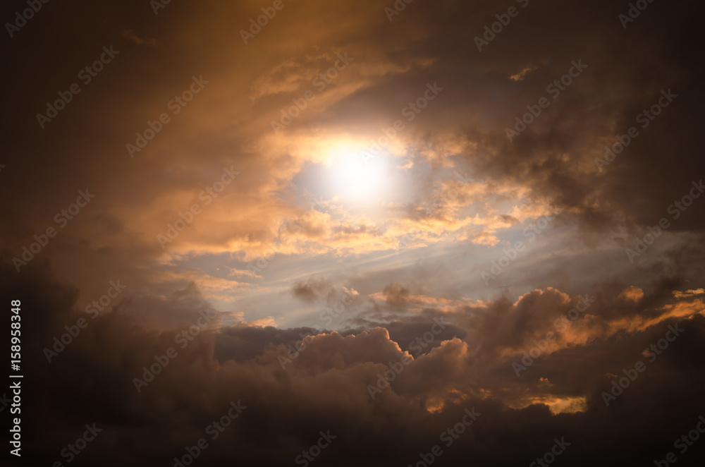 Fototapeta premium Storm clouds in the sunset light