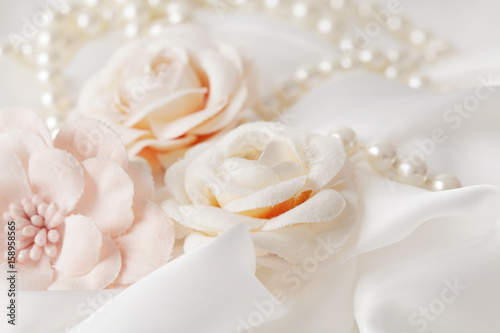wedding background, bridal flowers and pearl jewelry