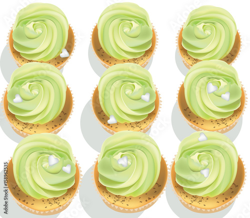 Cupcakes on a white table. Summer delicious desserts greenery color