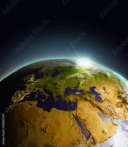 Fototapeta Naklejka Na Ścianę i Meble -  Sunrise above EMEA region from space
