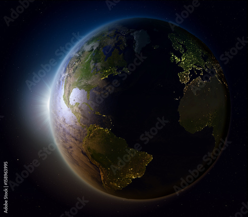Fototapeta Naklejka Na Ścianę i Meble -  Sunset above Northern Hemisphere from space