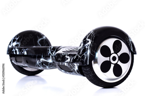 Black with light color self-balancing scooter or hoverboard isolated on white background. photo