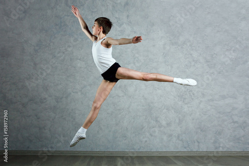 Little boy dancer in a dance studio