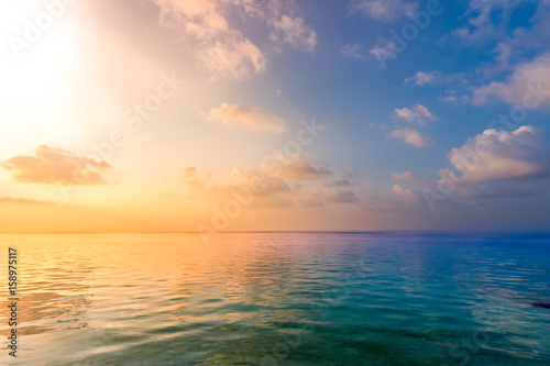 Calm sea ocean blue sky background. Zen background, inspirational sky clouds background. Natural sunset, sea, background horizon, sea sunset view. 