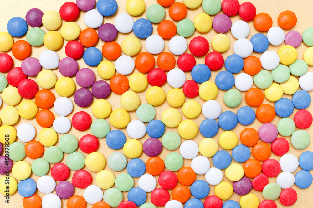 lollipops, candy, top view flat lay on yellow background lollipops, candy, top view flat lay on yellow background