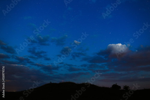 Starry sky after the sunset is photographed in the summer.