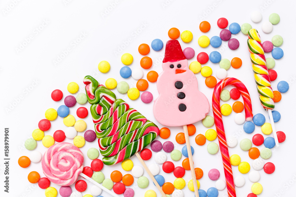 Obraz premium lollipops, candy, top view flat lay on white background
