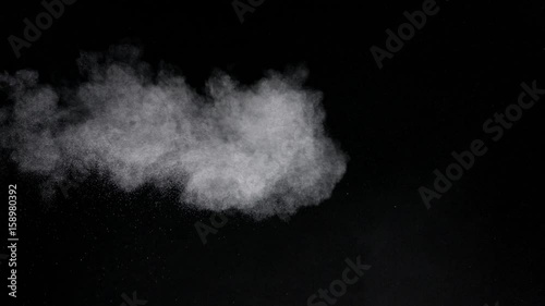 Jet of coarse particles from side filling frame and slowly dissipating