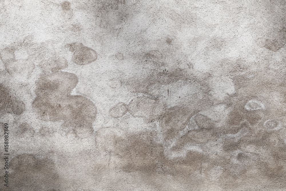 Naklejka premium Gray concrete wall with wet spots pattern