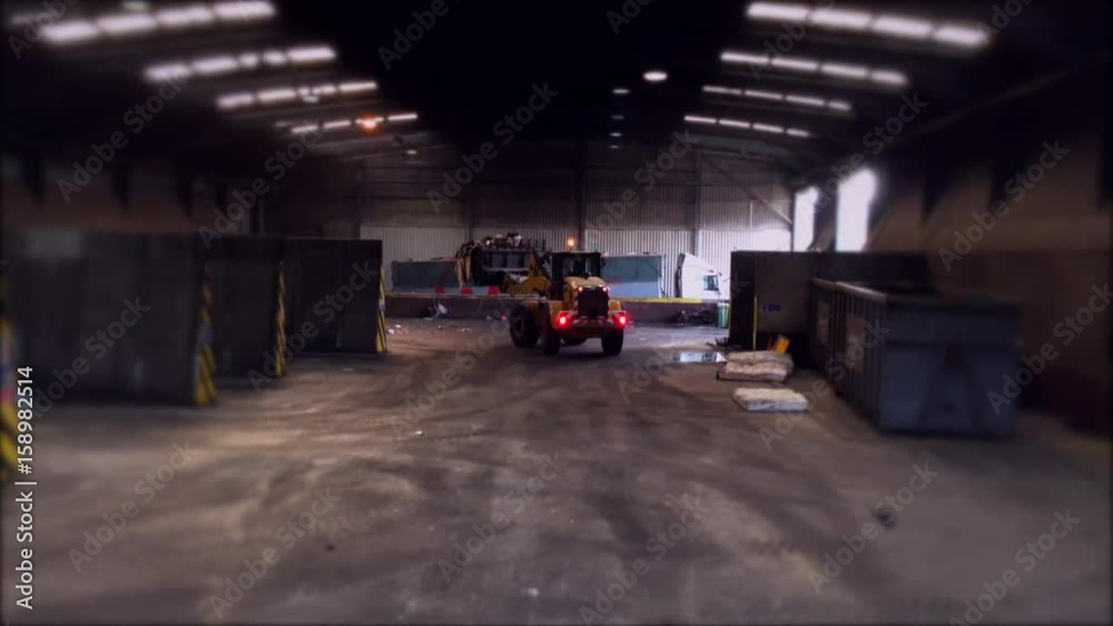 Large refuse recycling center with depot and trucks Large refuse recycling center with depot and trucks