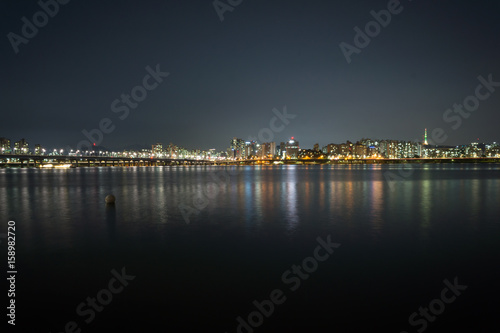 Korea,Seoul at night, South Korea city skyline at Dongjak Bridge Han river in Seoul , South Korea. © Mak