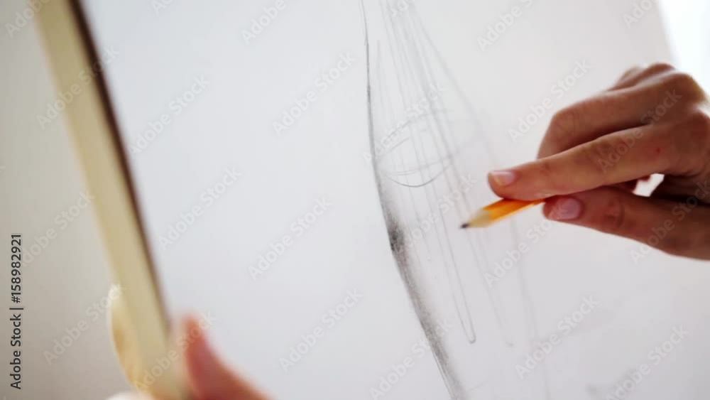 artist with pencil drawing still life on paper