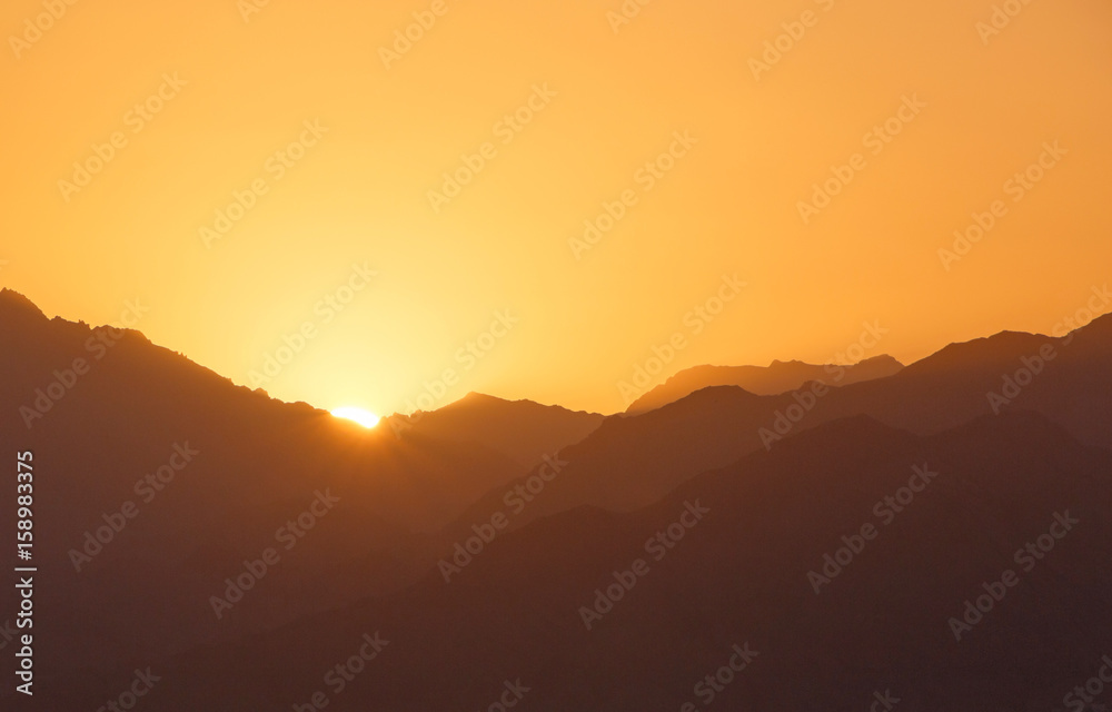 sunrise above mountains in Aqaba, Jordan