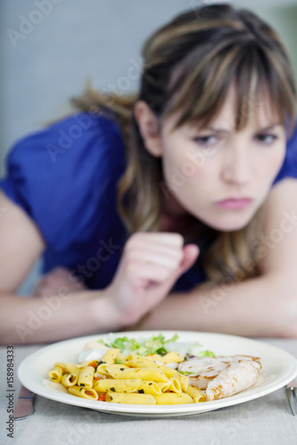 Woman looking her meal