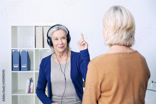 Senior woman undergoing a hearing test