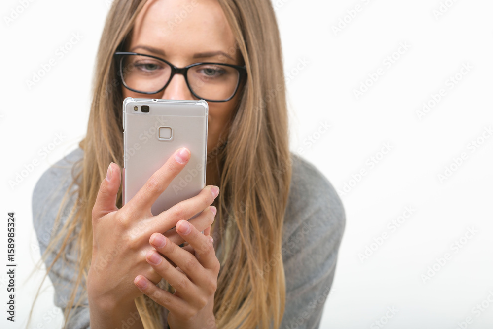 Beautiful girl on white background with phone