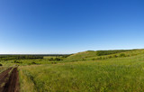 Panoramic view of the hill and the valley. Landscape of the central part of Russia.