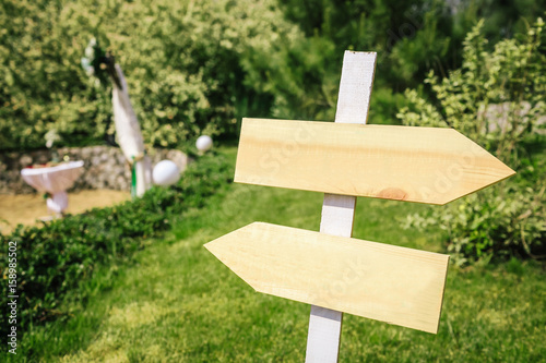 Wedding pointer in rustic style for a ceremony in garden photo