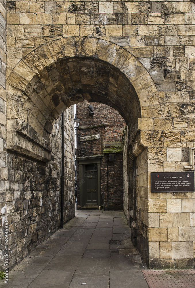 Buildings and the 13th Century Medieval wall which surrounds the City of York in northeast England. 