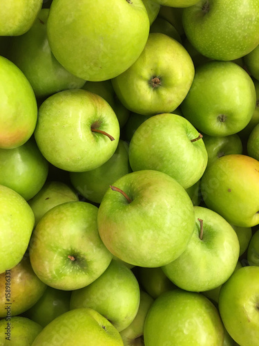 Top view of green apples in pile