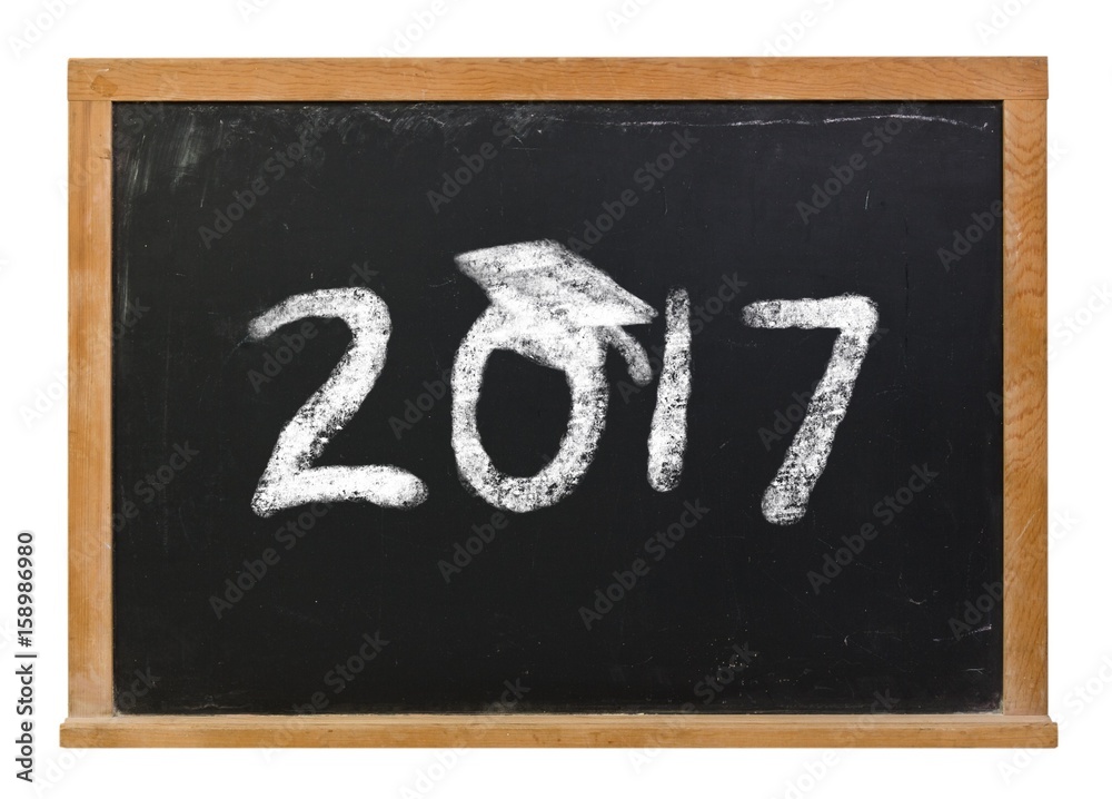 Class of 2017 written with white chalk on a black chalkboard isolated on white Class of 2017 written with white chalk on a black chalkboard isolated on white