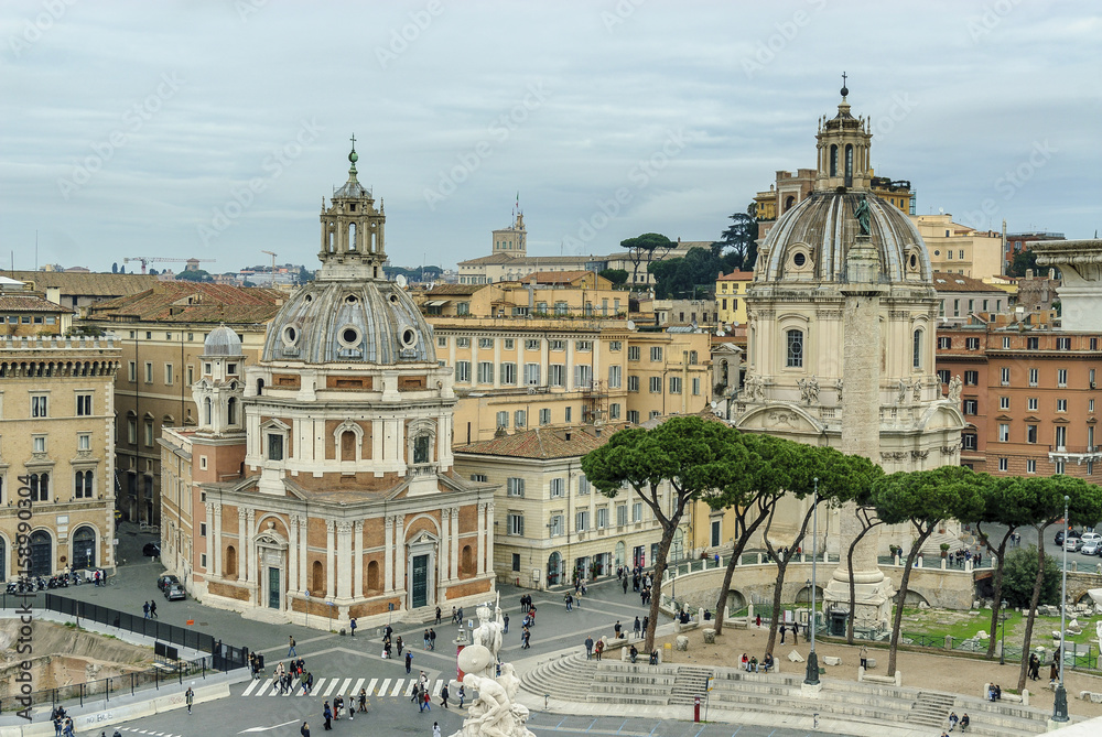 urban scenery with the square of Venice and of the Roman imperial forum in the city of Rome, Italy.