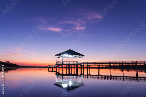 Sunset  Twilight at the reservoir with pavilion Silhouette. Bueng Si Fai Phichit. 