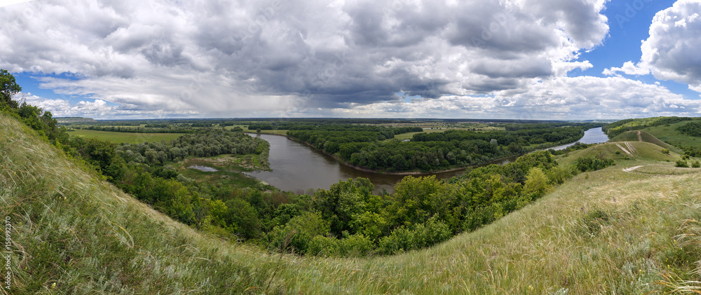 Panoramic view from the hills to the valley of the Don river. Landscape of the central part of Russia.