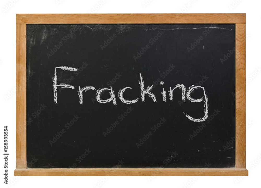 Fracking written in white chalk on a black chalkboard isolated on white Fracking written in white chalk on a black chalkboard isolated on white