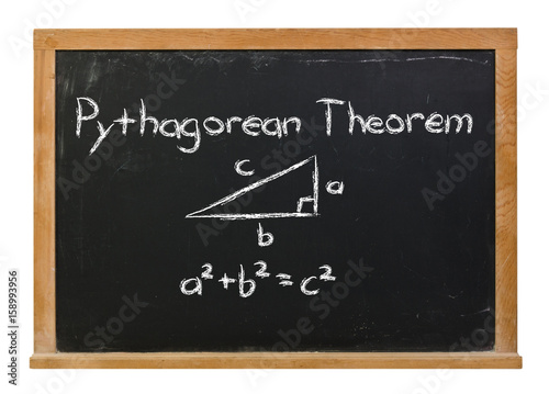 Fototapeta Naklejka Na Ścianę i Meble -  Pythagorean Theorem written in white chalk on a black chalkboard isolated on white
