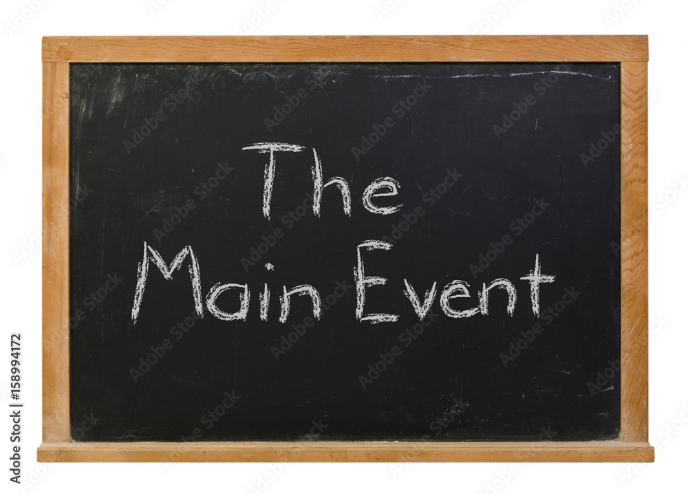 Obraz premium The Main Event written in white chalk on a black chalkboard isolated on white